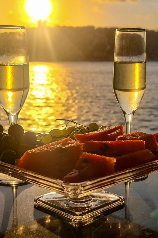 Istanbul: Bosphorus Sunset Cruise with Drinks & Snack - The shoreline route: Dolmabahçe, Çırağan, Ortaköy, and Bebek from the water