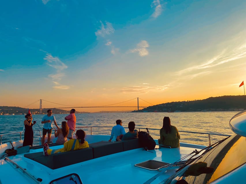 Istanbul: Bosphorus Sunset Yacht Cruise with Live Guide - Bosphorus Bridges and Fortresses: Europe’s Waterfront From a Moving Angle