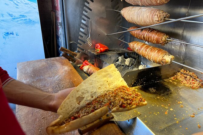 Istanbul Guided Street Food Tour Around European and Asian Sides - Coffee Break on the Kurdish Family Route: Charcoal Brew and Optional Fortune Reading