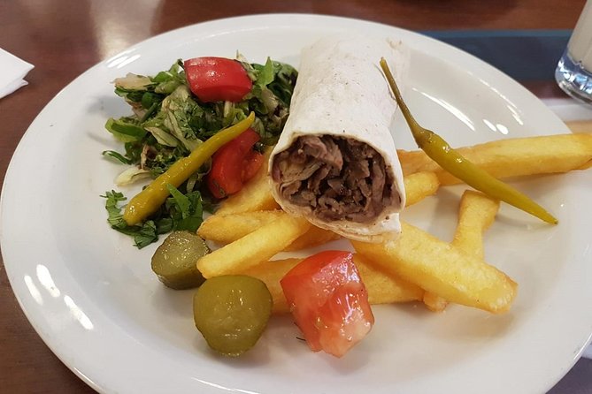 Istanbul Kadikoy Food Tour with 12+ Local Delicacies Tastings - Stop 4: Güneşlibahçe Sokağı lahmacun and market atmosphere