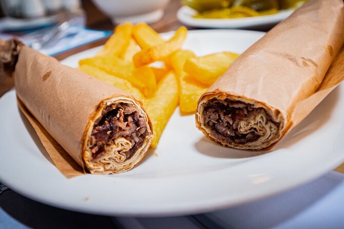 Istanbul Kadikoy Food Tour with 12+ Local Delicacies Tastings - Stop 5: Arayıcıbaşı Sokağı antiques, umbrella street, and bar culture