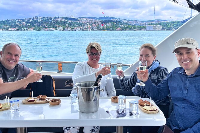 Luxury Bosphorus Yacht Tour – Asian Side Stop & Exploration - Asian-side highlights before Kanlıca: Anadolu Hisarı, Küçüksu, Beylerbeyi, Kız Kulesi