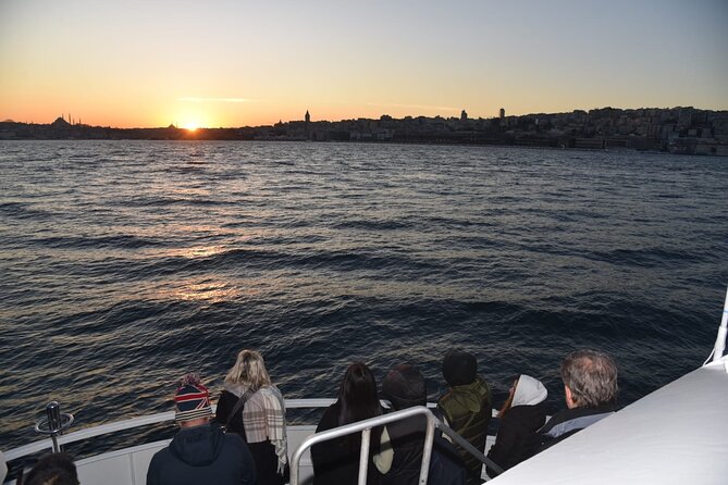 Sunset Cruise with Stop along Asia: Discover Istanbul's Bosphorus - Ortaköy from the boat: markets, mosque silhouettes, and photo time