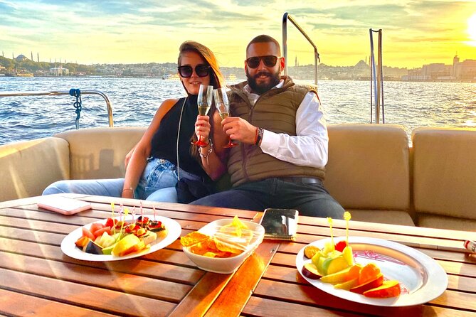 Sunset or Daytime Istanbul Guided Luxury Yacht Cruise with Snacks - Dolmabahçe Palace, Ortaköy, and the Bosphorus shoreline you can actually read